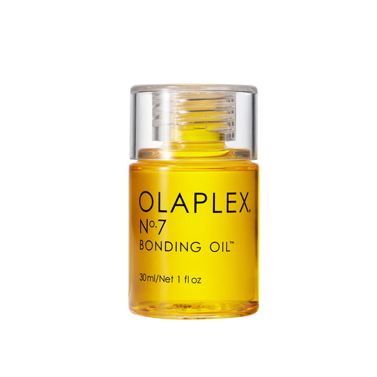 Eine Flasche Olaplex No. 7 Bonding Oil in leuchtendem Gelb auf weißem  Hintergrund.