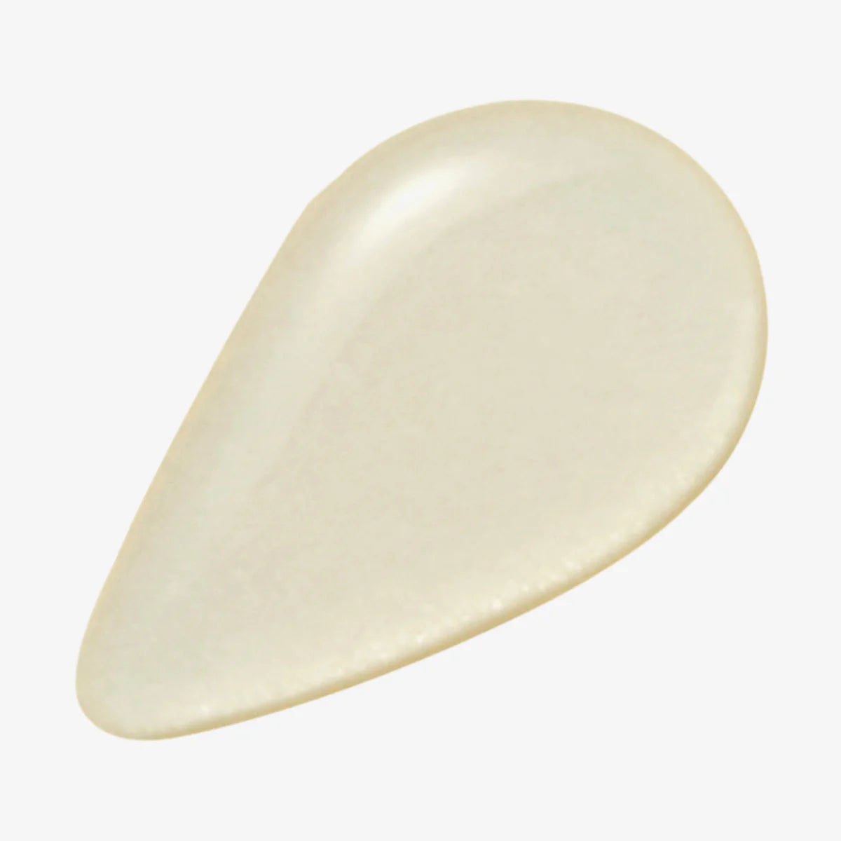 Ein Tropfen des Produkts, auf einer weißen Oberfläche.