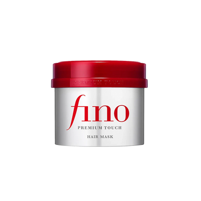 Silberne Dose Hair Mask mit rotem Deckel und schlichtem, modernen Design auf schwarzem Hintergrund.