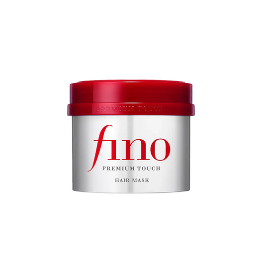 Silberne Dose Hair Mask mit rotem Deckel und schlichtem, modernen Design auf schwarzem Hintergrund.