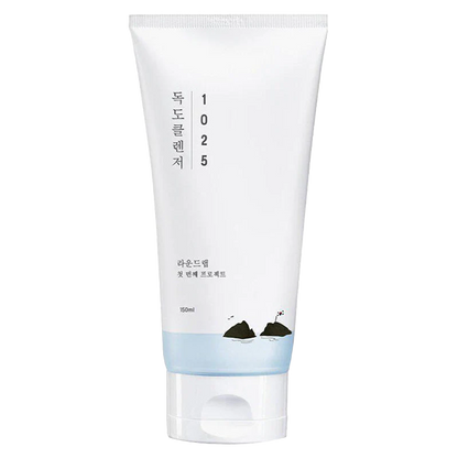 Minimalistische weiße Tube mit blauem Boden, ziert eine subtile Illustration von Felsen, 150 ml.