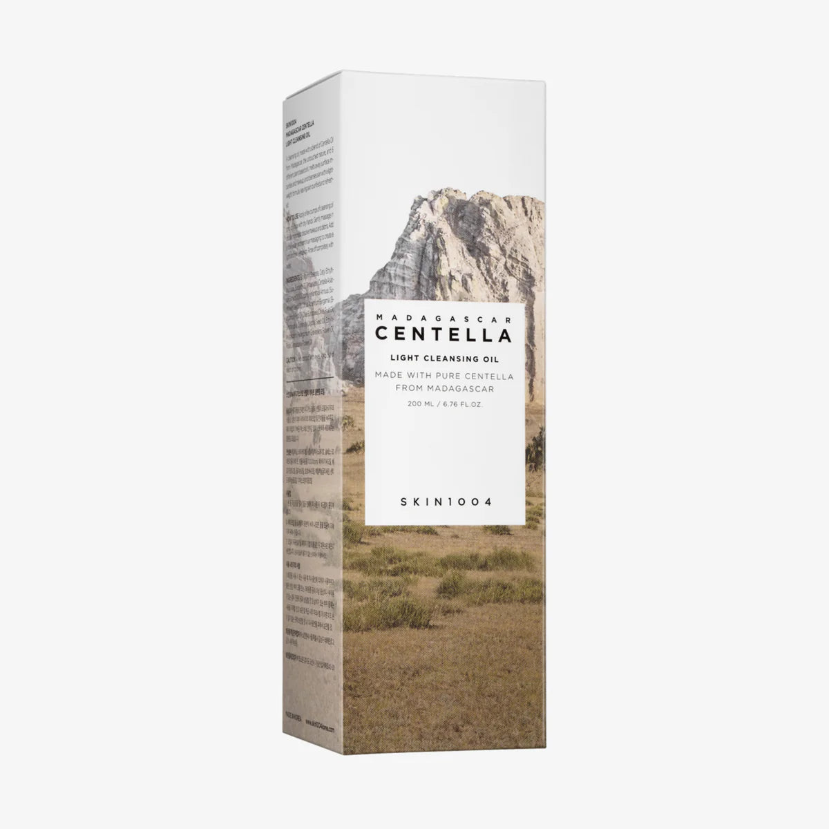 Verpackung des Cleansing Oils mit einem Landschaftsbild und minimalistischem Design.